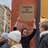 Guy Holding Cardboard Sign 22122022195909.jpg