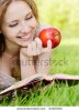 stock-photo-charming-girl-with-apples-lies-on-green-grass-and-reads-book-64587001.jpg