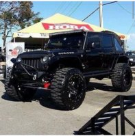 BLACK ON BLACK JEEP JK (with my favorite tires) NITTO MUD GRAPPLER TIRES.jpeg