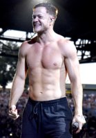 Dan-Reynolds-performing-shirtless.jpg