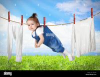 funny-child-hanging-on-line-with-clothes-laundry-creative-concept-EKR7F4.jpg