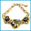 Gold necklace with black stones.jpg