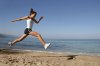 jumping-on-the-beach-girl.jpg