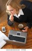 stock-photo-young-business-woman-drinking-coffee-and-doing-work-977940.jpg